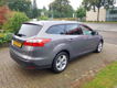 Ford Focus Wagon - 1.6 150PK CHAMPIONS ED. NAVI, VOORRUITVERW - 1 - Thumbnail