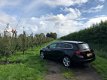 Opel Astra Sports Tourer - 1.4 Turbo Sport *fulloption*18inch*Navi*onderhoudshistorie - 1 - Thumbnail
