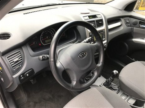 Kia Sportage - 2.0 CVVT X-ecutive Climate Control - 1