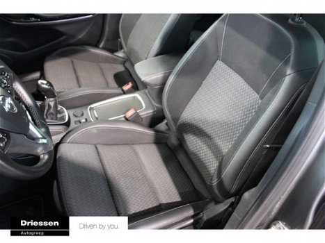 Opel Astra - 5drs 1.0 Innovation ( Navigatie - Climate Control - ASR stoelen) - 1