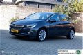 Opel Astra - 1.0 105PK 5 Drs. sportstoelen AGR/nav/tel/ecc/pdc/lmv17 - 1 - Thumbnail