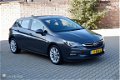 Opel Astra - 1.0 105PK 5 Drs. sportstoelen AGR/nav/tel/ecc/pdc/lmv17 - 1 - Thumbnail