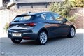 Opel Astra - 1.0 105PK 5 Drs. sportstoelen AGR/nav/tel/ecc/pdc/lmv17 - 1 - Thumbnail