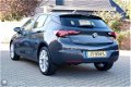 Opel Astra - 1.0 105PK 5 Drs. sportstoelen AGR/nav/tel/ecc/pdc/lmv17 - 1 - Thumbnail