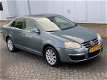 Volkswagen Jetta - 2.0 FSI Highline 150PK Automaat/Navi/Clima NAP - 1 - Thumbnail