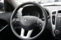 Kia Cee'd - 1.4 CVVT X-tra Airco, Trekhaak - 1 - Thumbnail