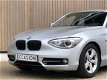 BMW 1-serie - 114i EDE Business Sport - 1 - Thumbnail