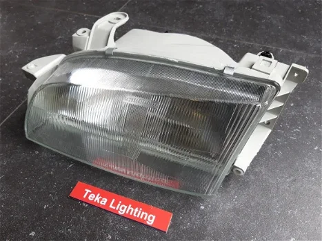 Toyota Carina E T19 (95-97) Koplamp Bosch 0318097313 Links NOS - 4