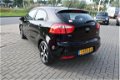 Kia Rio - 1.2 CVVT BusinessLine Cruise / airco / Elek. ramen - 1 - Thumbnail