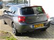 BMW 1-serie - 118d High Executive Automaat Leder Sportstoel Xenon Gr Navi Clima PDC Stoelverw - 1 - Thumbnail