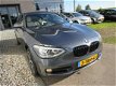 BMW 1-serie - 118d High Executive Automaat Leder Sportstoel Xenon Gr Navi Clima PDC Stoelverw - 1 - Thumbnail