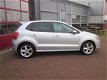 Volkswagen Polo - 1.2 TSI Highline DSG ECC/LMV 16