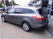 Ford Focus Wagon - Titanium-125pk-18-inch vol optiesdriv.ass.pack-half stof/leder navi-winterpakket- - 1 - Thumbnail