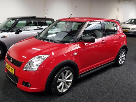 Suzuki Swift - 1.3 exclusive, sport uitvoering 5 deurs met airco en NAP - 1