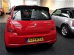 Suzuki Swift - 1.3 exclusive, sport uitvoering 5 deurs met airco en NAP - 1 - Thumbnail