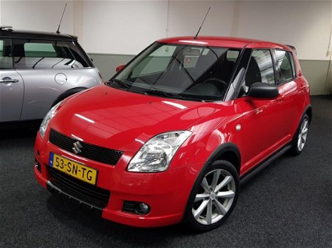 Suzuki Swift - 1.3 exclusive, sport uitvoering 5 deurs met airco en NAP - 1