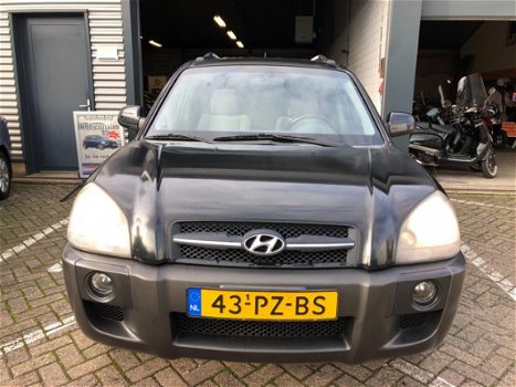 Hyundai Tucson - 2.0 CRDi Dynamic 5-deurs airco lm-velgen elektrische ramen+spiegels cruise controle - 1