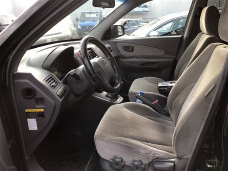 Hyundai Tucson - 2.0 CRDi Dynamic 5-deurs airco lm-velgen elektrische ramen+spiegels cruise controle - 1