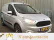 Ford Transit Courier - 1.6 TDCI 96 PK CLIMA, STOELVERWARMING, PDC - 1 - Thumbnail