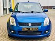 Suzuki Swift - 1.3 - NAP - LAGE KM - AIRCO - CLIMATE CONTROLE - 1 - Thumbnail