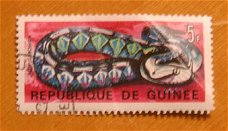 postzegel Guinea (slang)