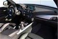 BMW 1-serie - 114i High Executive M-Sport / Xenon/ Navigatie Professional/ Lane departure warning - 1 - Thumbnail