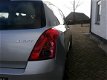 Suzuki Swift - 1.3 16v COMFORT Airco elec. pakket 6 MND GARANTIE + NWE APK + GROTE BEURT ALL-IN - 1 - Thumbnail