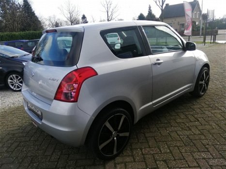 Suzuki Swift - 1.3 16v COMFORT Airco elec. pakket 6 MND GARANTIE + NWE APK + GROTE BEURT ALL-IN - 1