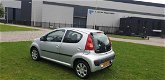 Peugeot 107 - 1.0-12V Sublime Lage km stand airco cv op afs elekramen stuurbkr - 1 - Thumbnail