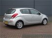 Hyundai i20 - 1.2i i-Deal - 15'' LMV | Trekhaak(945KG) | Bluetoo th - 1 - Thumbnail