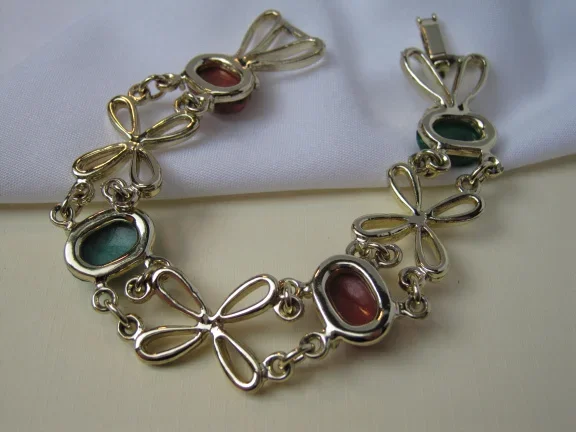 Armband goudkleurig met kunststof scarabees en bloemschakels 18 cm - Afbeelding 6