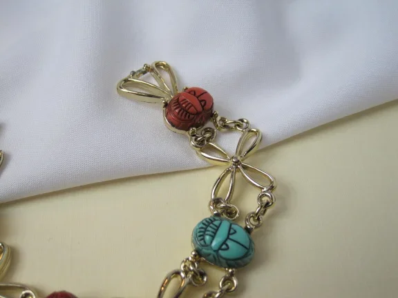 Armband goudkleurig met kunststof scarabees en bloemschakels 18 cm - Afbeelding 7