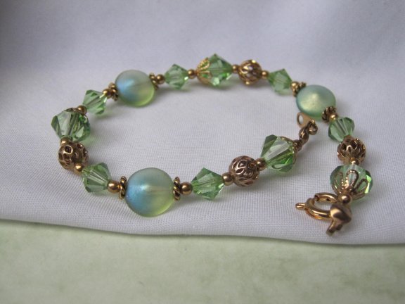 Armband groen helder en frosted kristal kralen goudkleurige spacers en kralen 19 cm - Afbeelding 6