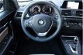BMW 1-serie - 118i Executive (LEER/Xenon/NAV./Climate/LED/NL AUTO) - 1 - Thumbnail