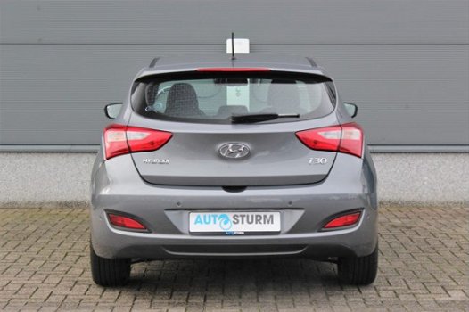 Hyundai i30 - Coupé 1.4 i-Motion Plus | Radio-CD/MP3 Speler | Cruise & Climate Control | Park. Senso - 1