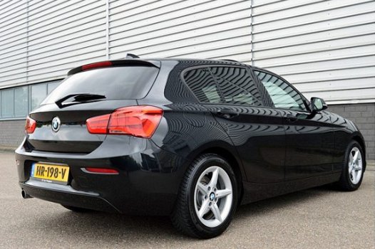 BMW 1-serie - 118i EDE Corporate Lease Essential RIJKLAAR PRIJS-GARANTIE Schuifdak Navigatie Sport I - 1