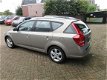 Kia Cee'd - 1.4 CVVT Navigator Plus Pack NAVIGATIE/ CLIMATRONIC/ CRUISE CONTROL - 1 - Thumbnail