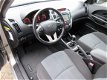 Kia Cee'd - 1.4 CVVT Navigator Plus Pack NAVIGATIE/ CLIMATRONIC/ CRUISE CONTROL - 1 - Thumbnail