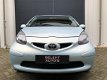 Toyota Aygo - 1.0-12V Sport Airco/LM Velgen/Elektrische Ramen/Stuurbekrachtiging/5-Deurs/Apk 10-2020 - 1 - Thumbnail