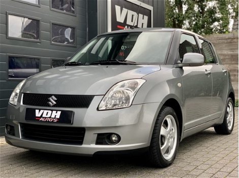 Suzuki Swift - 1.3 AIRCO - 5DRS - NAVIGATIE - KEYLESS GO - LMV - 1