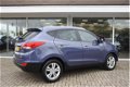 Hyundai ix35 - 1.6i GDI Style | Cruise control | Airco | Bluetooth | Navigatiesyteem | - 1 - Thumbnail