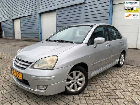 Suzuki Liana - 1.6 Exclusive ✅NAP, APK 18-11-2020, 2XSLEUTELS, AIRCO, STUURBEKR, ELEC RAMEN - 1