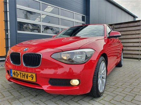 BMW 1-serie - 116i Business 5-deurs met Cruise control, Airco en Navigatie - 1