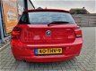BMW 1-serie - 116i Business 5-deurs met Cruise control, Airco en Navigatie - 1 - Thumbnail