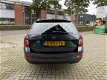 Skoda Octavia Combi - 1.6 TDI Elegance Businessline Automaat - 1 - Thumbnail