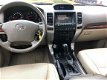 Toyota Land Cruiser - 3.0 D-4D AUT EXECUT-LEDER 7 PERS-NAVI -CLIMA- CRUISE - 6MND GAR -TOP STAAT -€ - 1 - Thumbnail