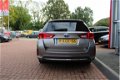 Toyota Auris - 1.8 Hybrid 136pk Aut Lease Navigatie Camera - 1 - Thumbnail