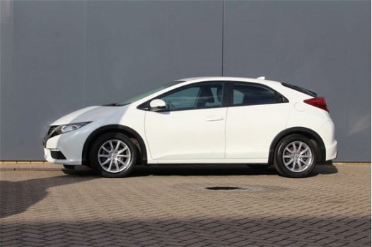 Honda Civic - 1.4 Comfort | Tot 2 jaar garantie | Cruise control | Climate control | Magic Seats | L - 1