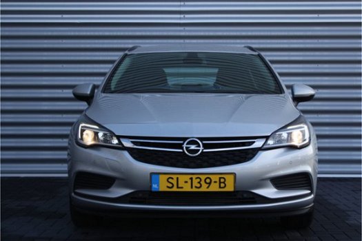 Opel Astra Sports Tourer - 1.0 TURBO 105PK ONLINE EDITION / NAVI / AIRCO / LED / PDC / ONSTAR / TREK - 1