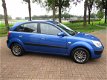 Kia Rio - 1.4 L, 5 Drs, Airco etc, Gereserveerd - 1 - Thumbnail